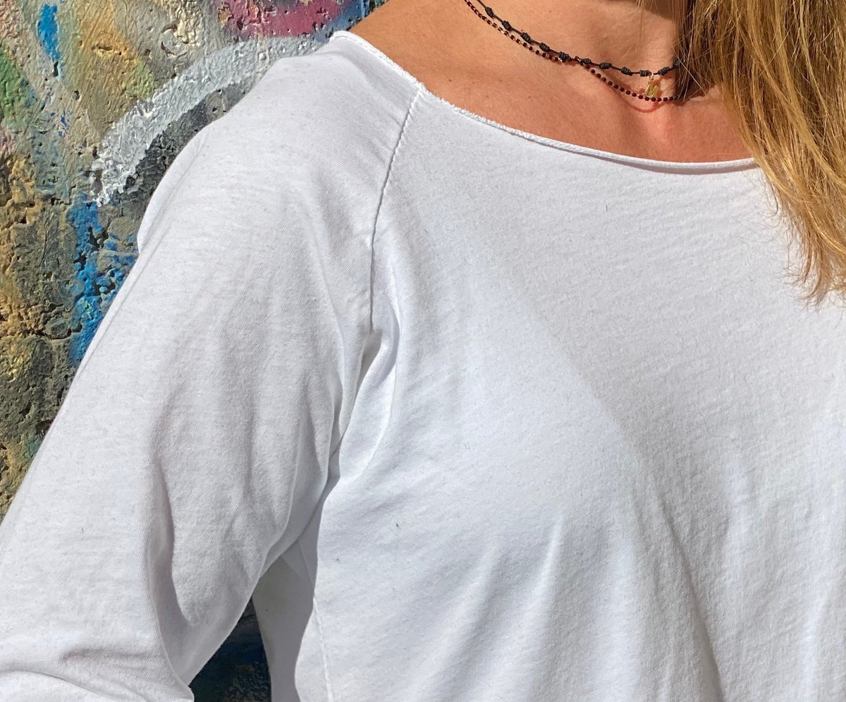 Básica cuello barco blanca