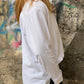 Camiseta larga con botones blanca